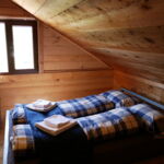 Schlafzimmer in der Berghütte Wolfsbett